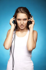 Young woman with headphones listening music 8