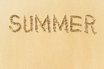 Word summer on beach