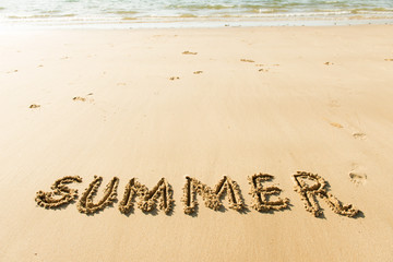 Word summer on beach