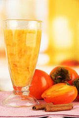Ripe persimmons with cocktail and cinnamon