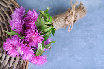 Cornflowers on wooden background