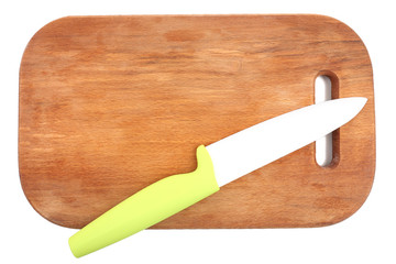 Kitchen knife and cutting board isolated on white