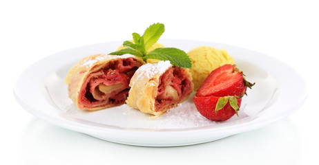 Tasty homemade strudel with ice-cream, fresh strawberry and