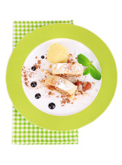 Tasty homemade apple strudel mint leaves and ice-cream