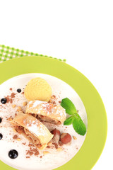 Tasty homemade apple strudel mint leaves and ice-cream