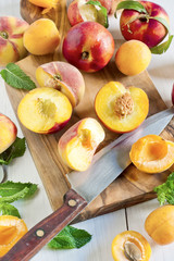 Naklejka na ściany i meble Apricots, nectarines and saturn peaches