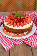 Delicious biscuit cake with strawberries