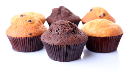 Tasty muffins isolated on white