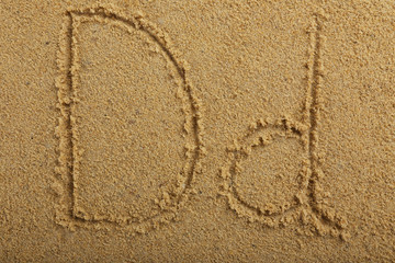 Alphabet letter written on wet beach sand
