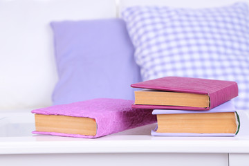 Books on coffee table in room