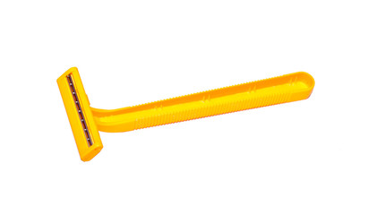 yellow shaver on white background