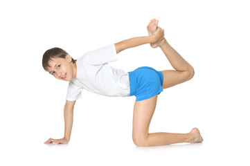 Teenage boy exercising yoga