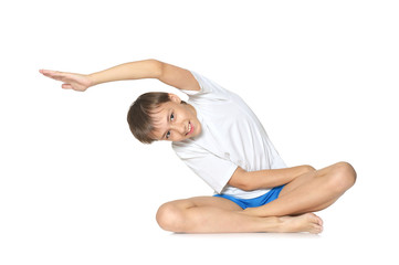 Teenage boy exercising yoga