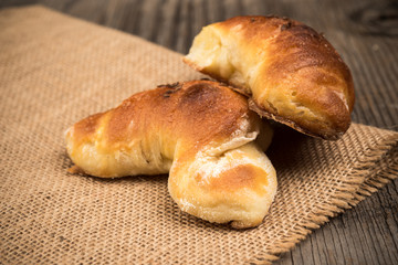 Homemade stuffed pastry with shape of rolls