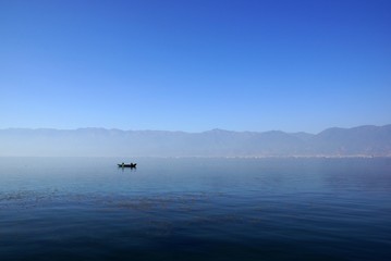 Obraz na płótnie Canvas People fishing on Erhai lake, Dali, Yunnan province, China