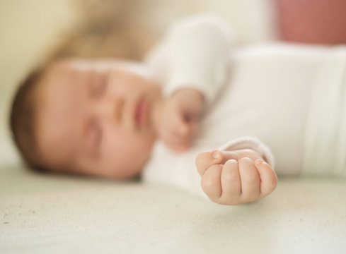 Cute baby on bed