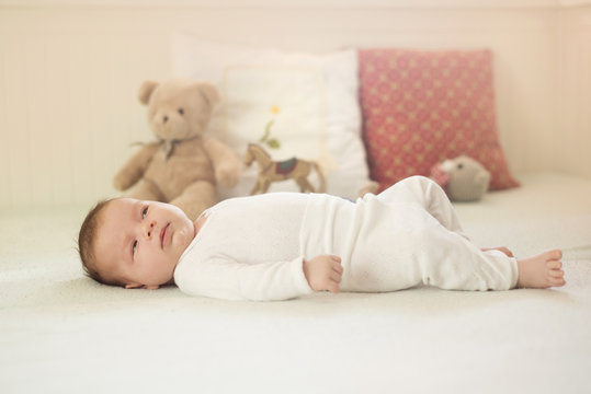 Cute baby on bed