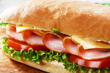 ham sandwich with cheese and tomatoes