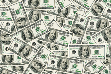 Dollars pile as background