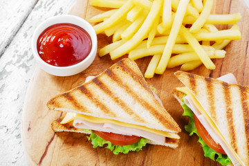Grilled sandwich with ham cheese  french fries
