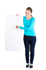 Happy woman with blank board