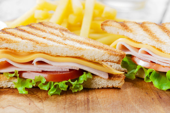 Grilled sandwich with ham cheese  french fries