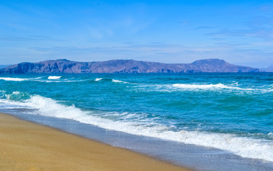 Sea cost with waves and sand, Crete, Greece