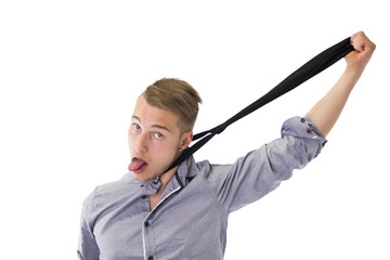 Funny young man hanging himself with neck-tie