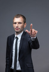 Portrait of executive pointing hand gestures, isolated