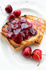 Delicious toast with homemade cherry jam