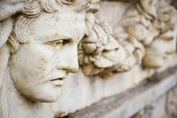 Fototapeta na wymiar Old greek portrait sculpture
