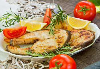 Crispy grilled salmon steak on the plate