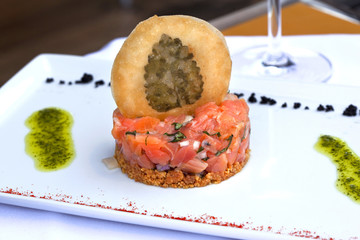 Salmon tartare, biscuit and sauce