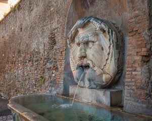 Fototapeta na wymiar Fountain in Aventine Hill, Rome, Italy