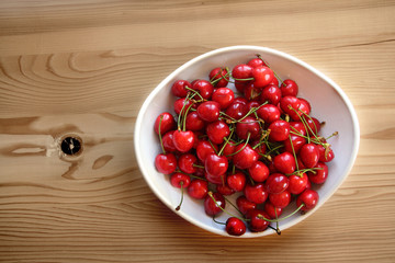 bowl of cherries on table