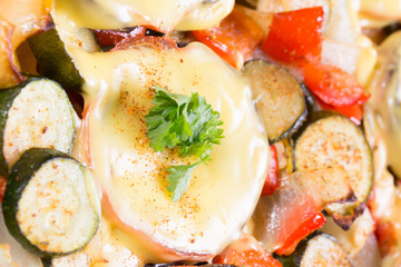 Baked mushrooms with cheese and parsley with vegetables