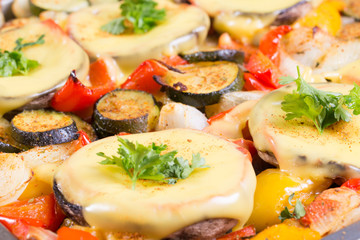 Baked mushrooms with cheese and parsley with vegetables