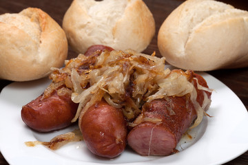 Fried sausage with onions.