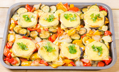 Baked mushrooms with cheese and parsley with vegetables