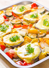 Baked mushrooms with cheese and parsley with vegetables