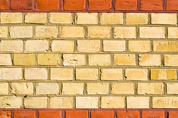 Yellow brickwall with red frame