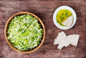 Cabbage salad in wooden bowl