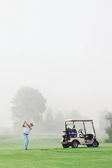 Photo sur Aluminium Golf homme de voiturette de golf