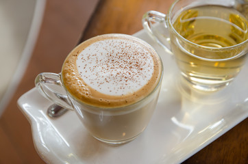 cappuccino with hot tea and sugar