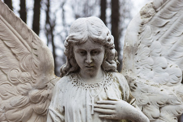 Old cemetery marble sculpture of the angel