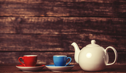 Teapot and two cup of tea.