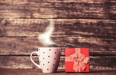 Gift box and cup of coffee