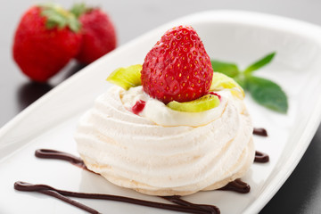 Meringue nest with strawberry