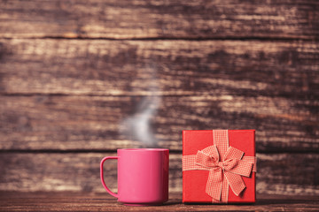 Gift box and cup of coffee