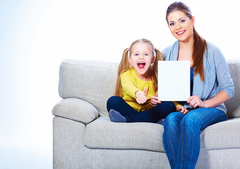 Woman with daughter hold white blank board.